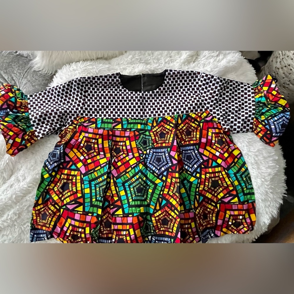 Hand Made multi colored blouse. Newly made never worn.  Comes in package.